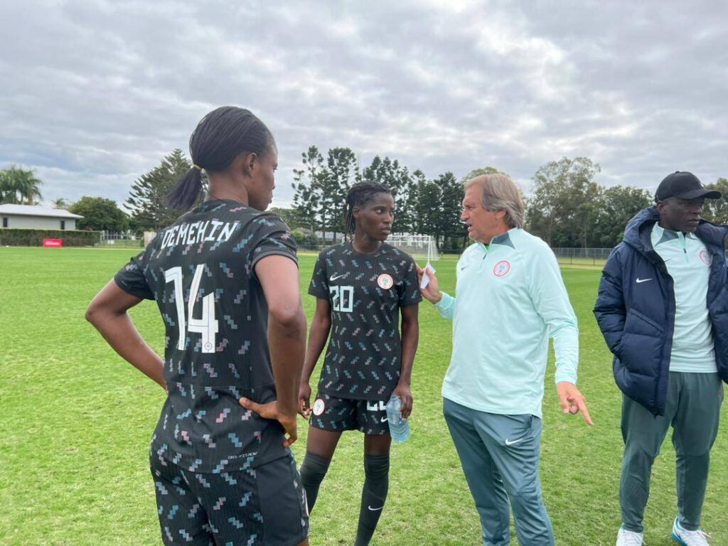 Randy Waldrum having a word with the Super Falcons